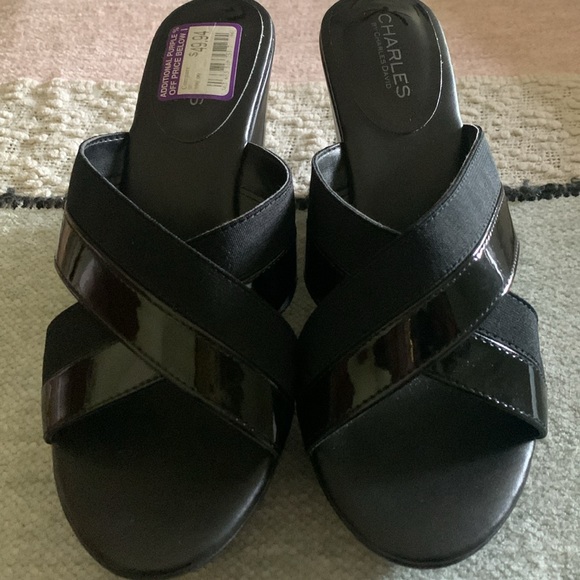 Black pair of platforms. Never worn!!!!! Paid 30 dollars for them. - Picture 8 of 8